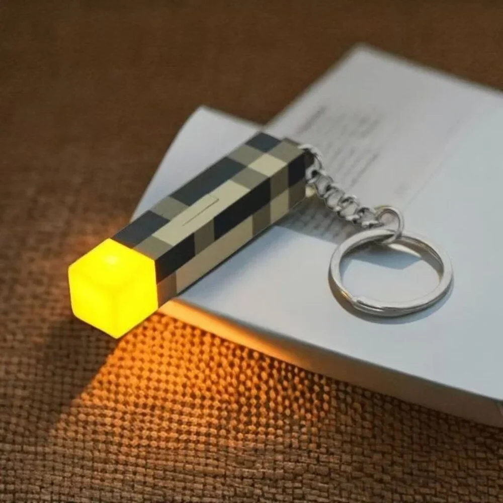 Pixel Torch Light Keychain – Battery Powered LED Mini Gadget for Fans!